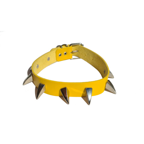 Yellow slave collar with spikes