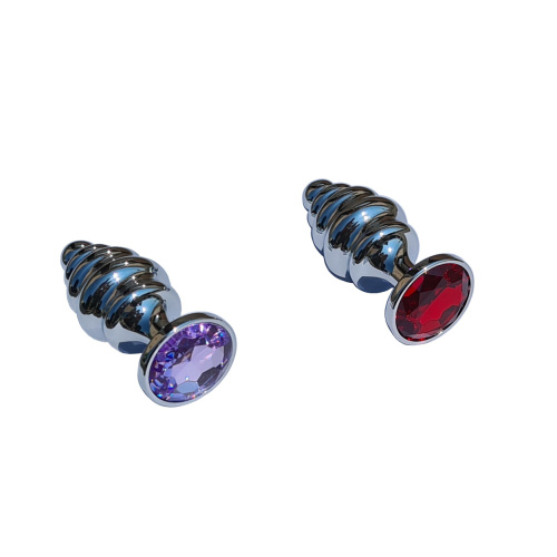 Metal anal plug with notches and precious stone